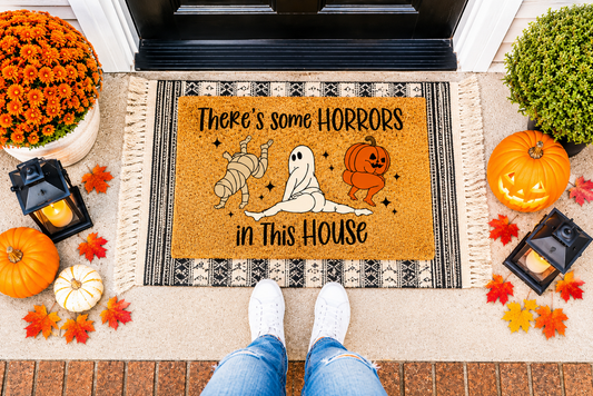 "There's Some Horrors in This House"  Welcome Mat